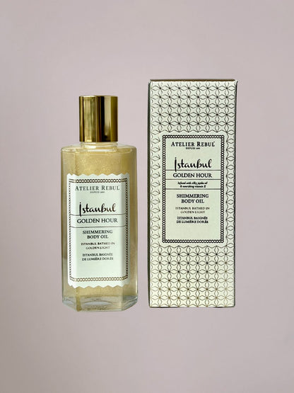 Golden Hour Body Shimmer van Atelier Rebul met subtiele gouden glans en warme luxe geur.